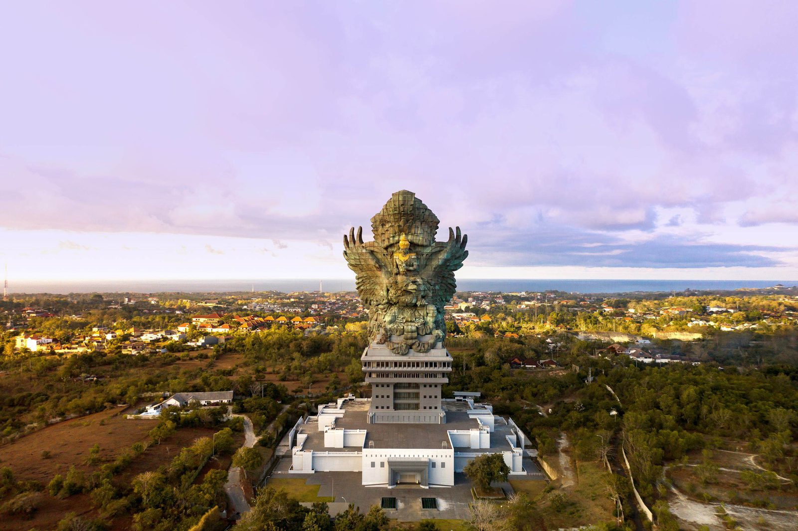 The Garuda Wisnu Kencana statue rising above the Bukit from the air